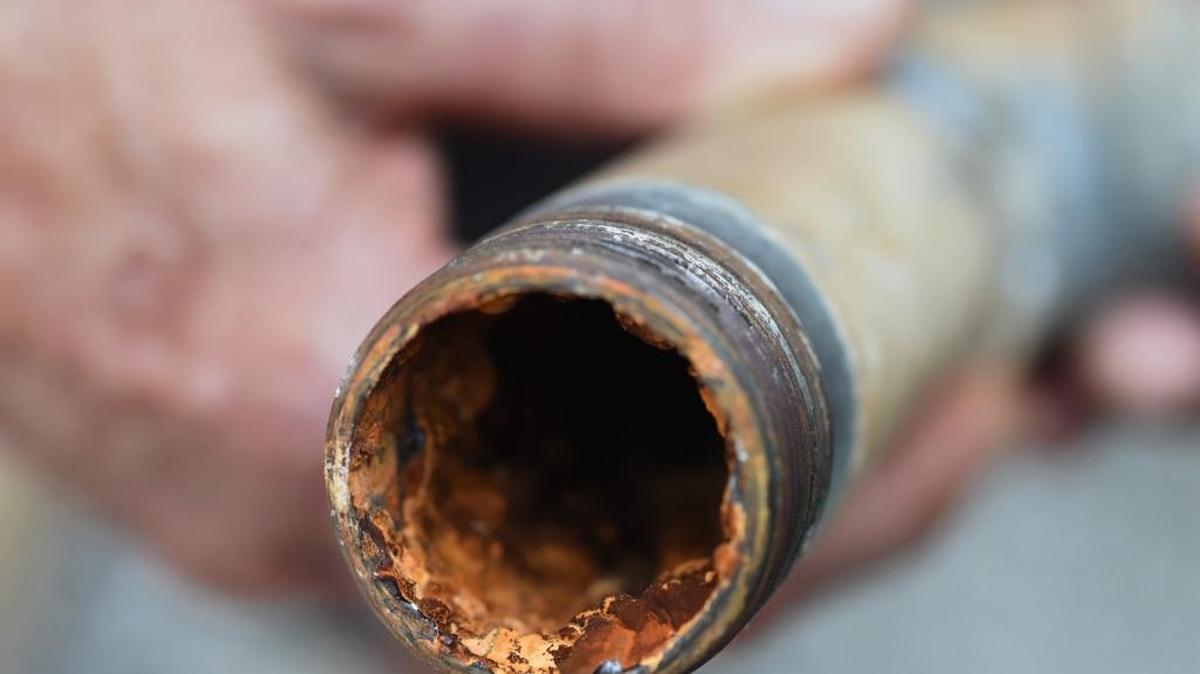 A piece of galvanized pipe from inside a northeast Fresno home shows a built-up coating of rust and scale on the inner surface in this June 2016 photo. Differences in water chemistry between treated surface water and pumped groundwater are believed to have contributed to discolored water in homes plumbed with galvanized pipes by dissolving the rust coating. Testing in some homes also showed lead in the water.