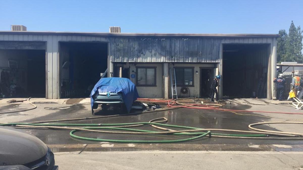 Vaq Auto Repair in east Fresno burned Saturday afternoon after a fire spread and extensively damaged the building.
