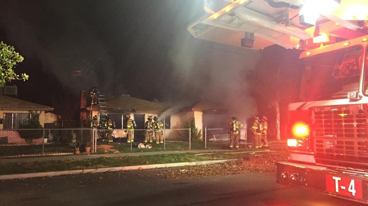 Fresno firefighters battle a blaze late Wednesday night at an abandoned home in southwest Fresno.