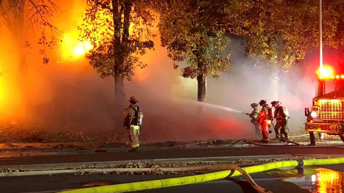 Fresno firefighters battle a two-alarm fire on Monday, Dec. 4, 2017. The fire left a 5,000-square-foot commercial building a total loss, said Fresno Fire Battalion Chief Kirk Wanless.