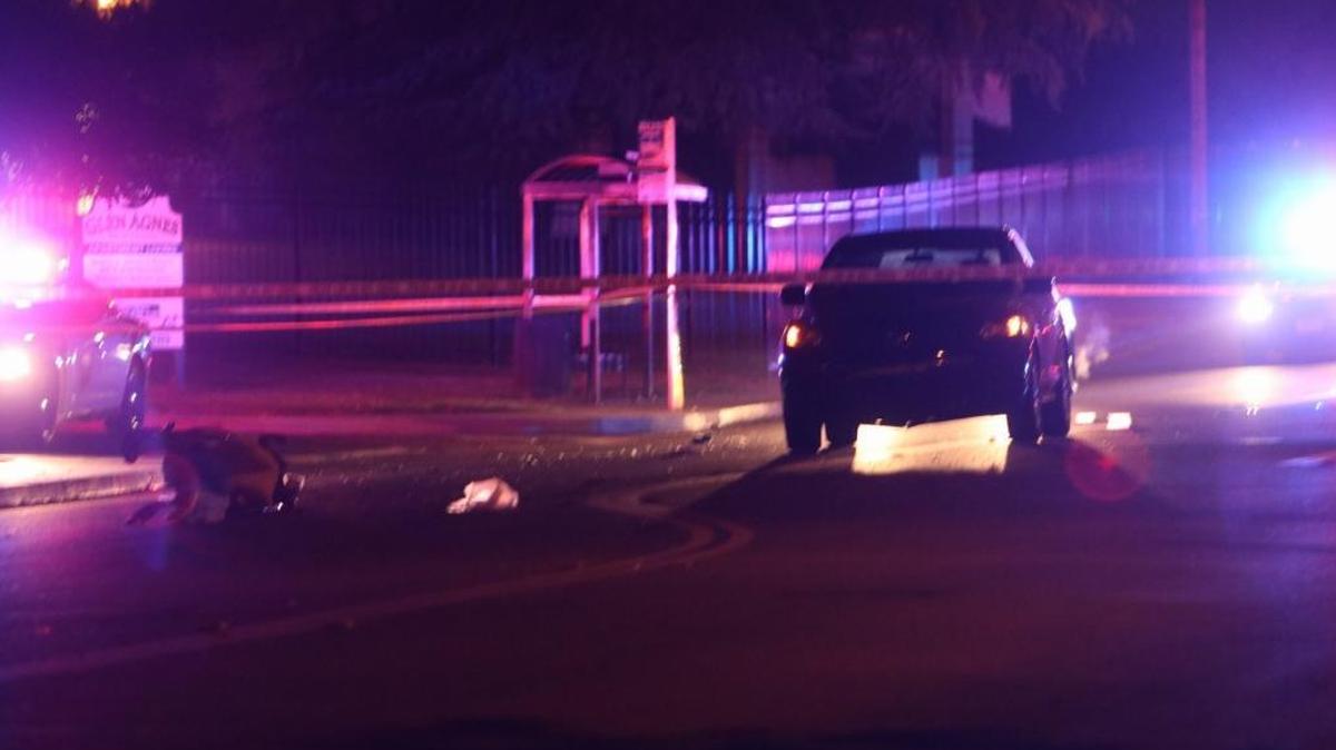 A wheelchair sits in the roadway after a fatal crash Sunday night in central Fresno.