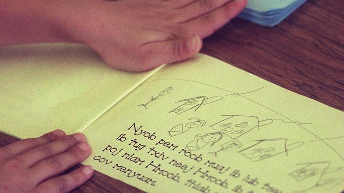 A first grader in a Hmong bilingual education class at Hidalgo elementary school in Fresno works on a project in their native language.