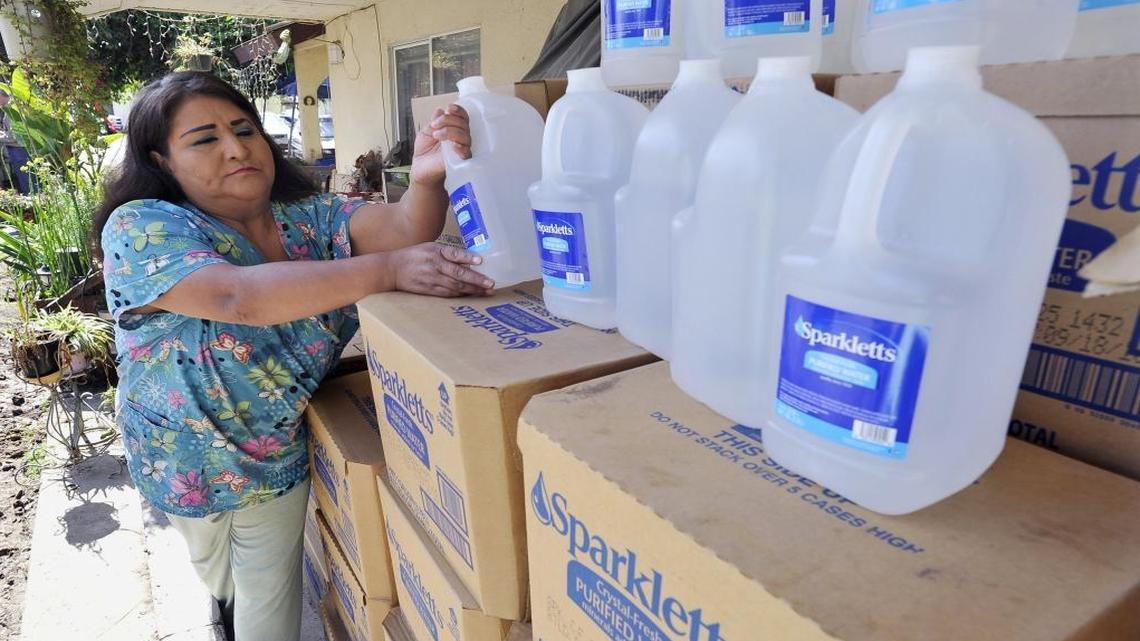 After her well went dry in the tiny Tulare County town of Monson, Maria Jimenez started using bottled water. This photo was taken in September 2015.