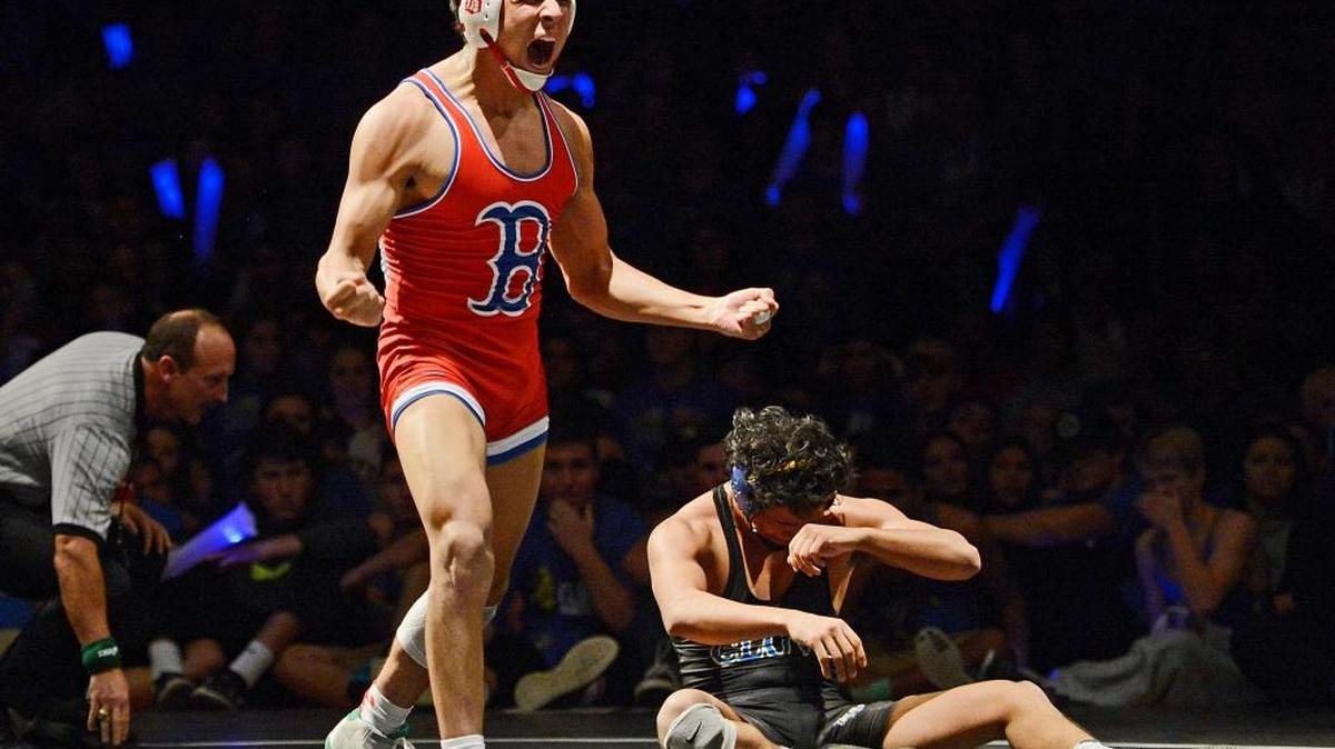 Award-winner: This Jan. 28, 2016 photo by The Fresno Bee’s Craig Kohlruss was judged best sports photo in the 29th annual George F. Gruner Awards. Buchanan’s Abner Romero, left, celebrates after pinning Clovis’ Victor Vargas in the 162-pound match of their Tri-River Athletic Conference wrestling match.