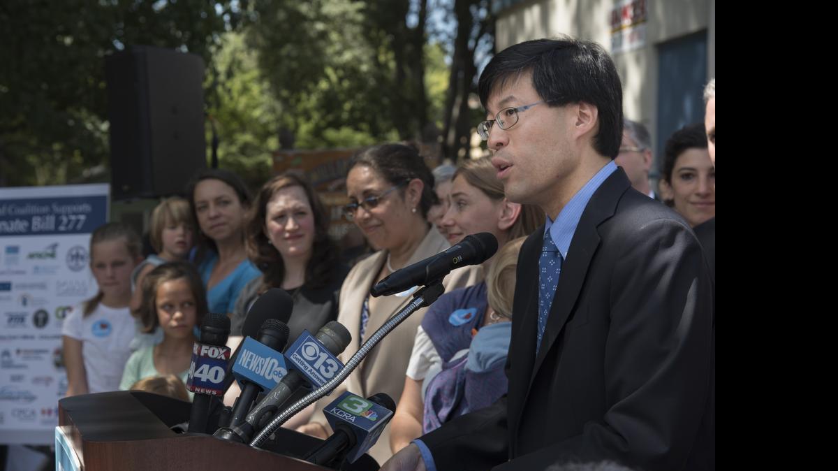 
Sen. Richard Pan speaks to supporters of Senate Bill 277, which eliminates personal and religious belief exemptions for vaccines, after the bill was signed on 
