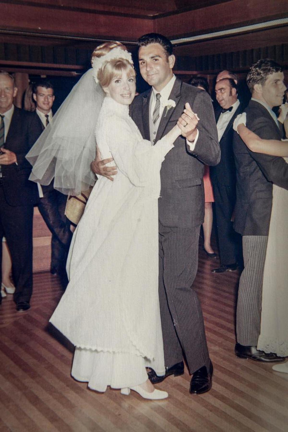 Sam and Linda Lucido pose for a photo while dancing at their wedding on July 20, 1969 in Oakland.