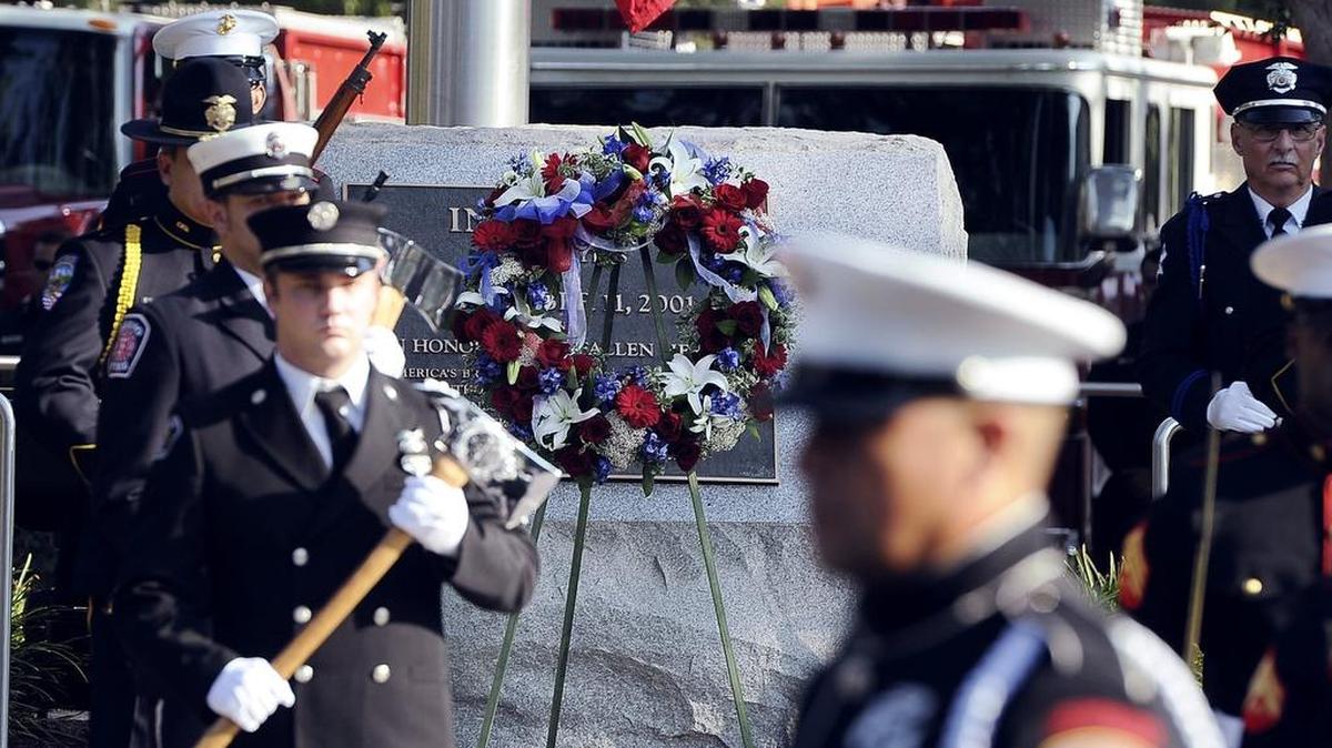 A wreath is placed at the memorial during the 2017 9/11 remembrance memorial event at Pelco by Schneider Electric.