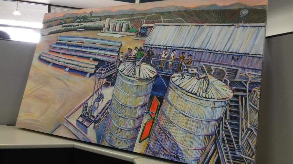 A painting by Fresno artist Anne Whitehurst shows a Zero Net Energy Farm plant owned by Biodico in Fresno County. The painting is part of a series on sustainable agriculture that premiered Wednesday, March 29, 2017.