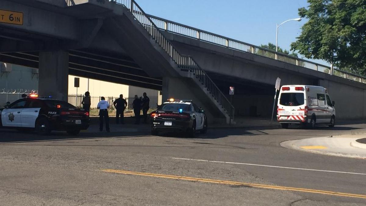 Police investigate the discoverey of a body at Stanislaus and G streets on Wednesday, June 22.
