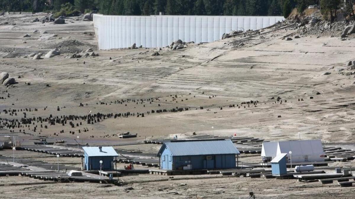 The dam is completely out of the water in the background and Sierra Marina is also high and dry at Shaver Lake during a dam maintenance project by Southern California Edison in 2011 and 2012.