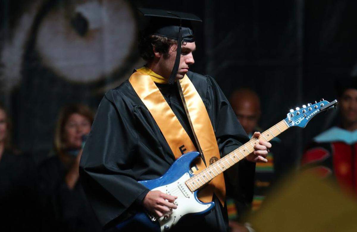 Graduate Ethan Hinds played the national anthem on an electric guitar during the Edison High School graduation ceremony at the Save Mart Center on June 5, 2023.