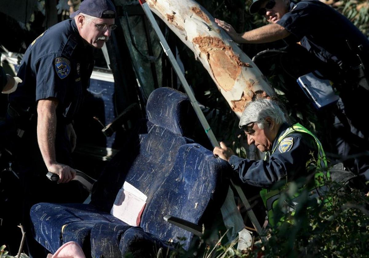 California Highway Patrol investigators look over seats from the July 22, 2010 Greyhound bus crash on Highway 99 in central Fresno in which six people were killed. The special investigators are critical to reconstructing what went wrong to cause a crash.