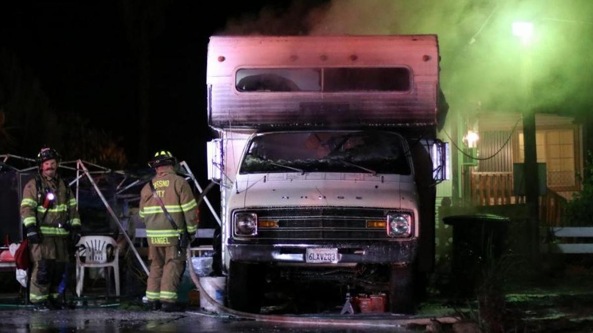 Firefighters put out flames at Westbrook Mobile Home Park in west Fresno on Thursday night, Jan. 4, 2018.