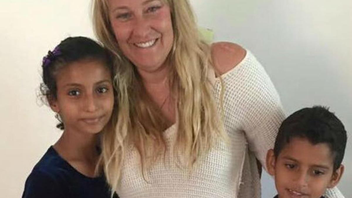 Julie Goldberg, an immigration lawyer based in the east African country Djibouti, with some of her clients.