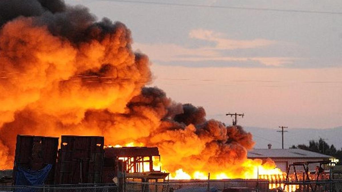 
A large fire burned Tuesday at Pacific Coast Recycling in Dos Palos. 

