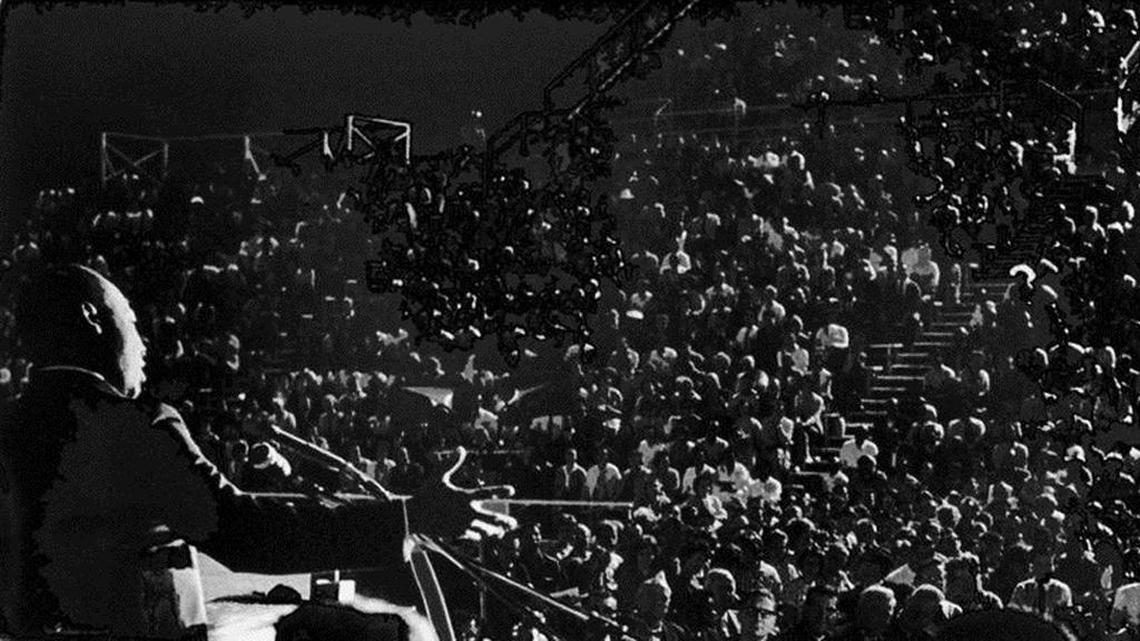 The Rev. Martin Luther King Jr. speaks at a rally at Fresno’s Ratcliffe Stadium in June 1964.