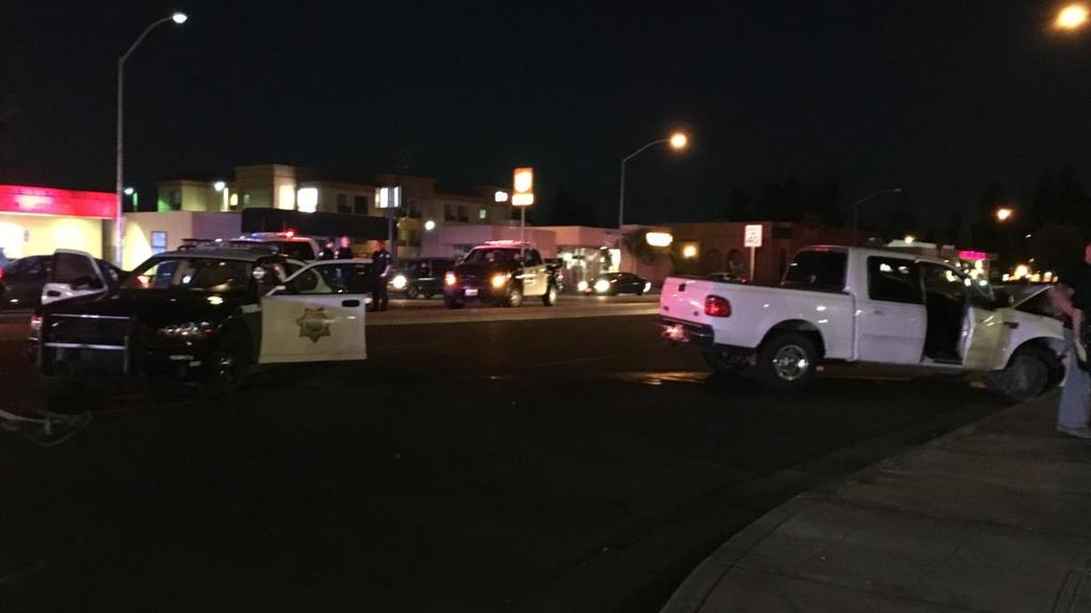 A Fresno police car and a Ford F-150 collided at the intersection of Shaw Avenue and Fresno Street in Fresno, Calif., on Monday, June 12, 2017.