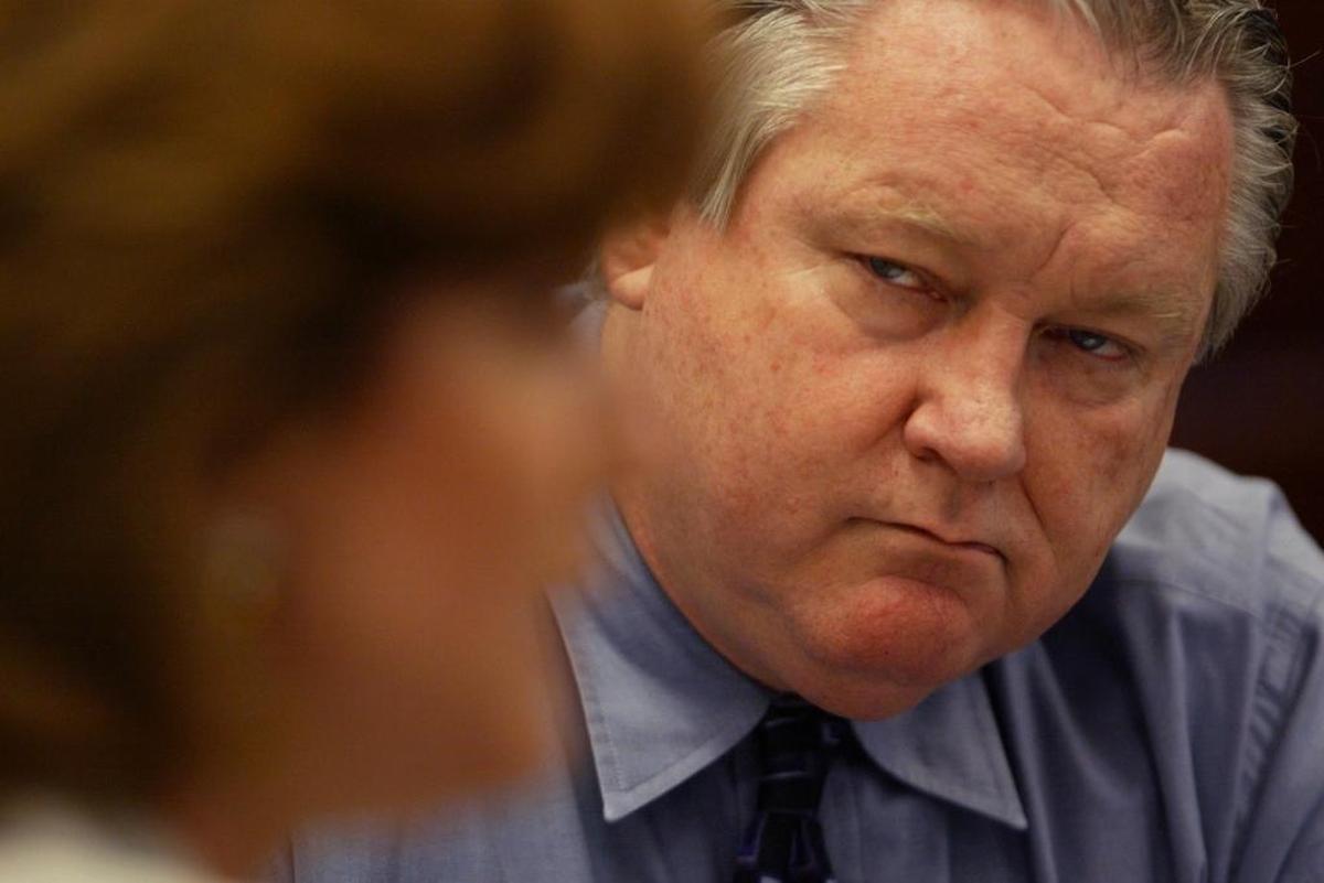 Jim Boren listens to gubernatorial candidate Arianna Huffington during a meeting with The Bee’s editorial board in September of 2003.