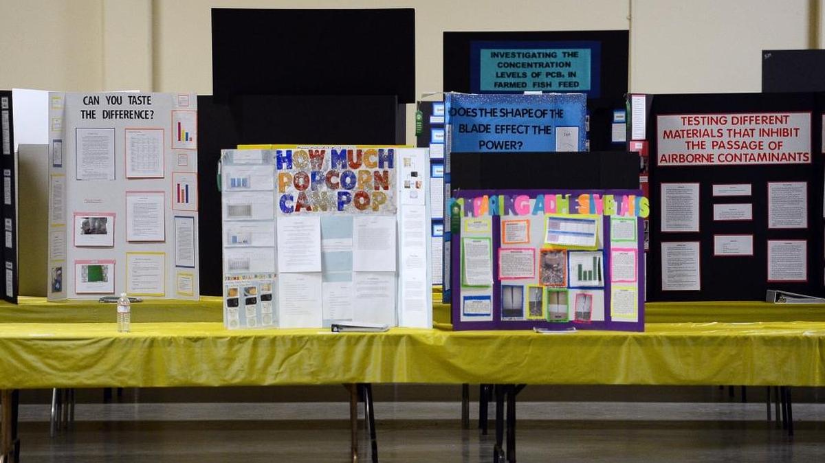An array of different science projects are seen during the Central California Regional Science, Mathematics and Engineering Fair at the Fresno Fairgrounds in 2013.