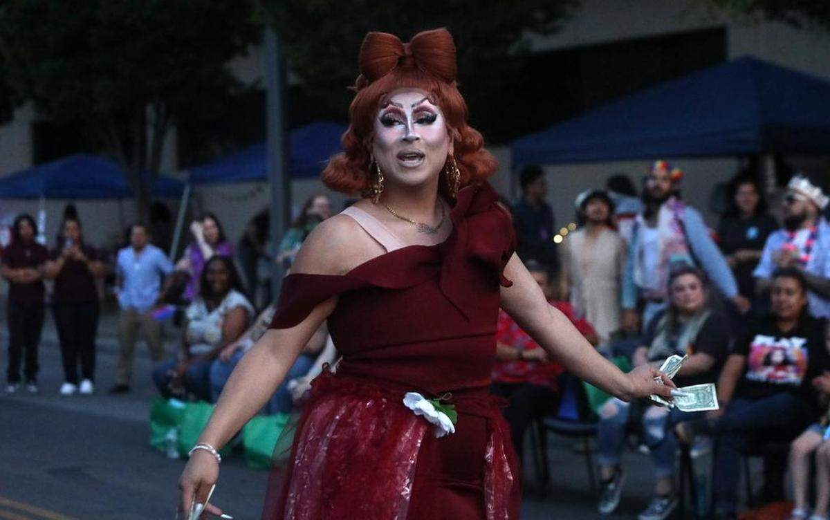 Drag show participant Felix performs at the Fresno Economic Opportunities Commission ‘Illuminate Our Pride and Our Mental Health’ street festival on Fulton Street on June 24, 2023. The celebration was organized by the EOC LGBTQ+ Resource Center.