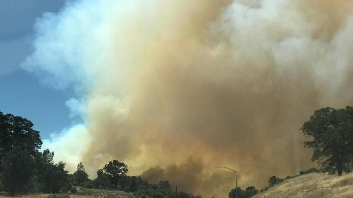 Smoke fills the air from the Spring Fire south of Mariposa.