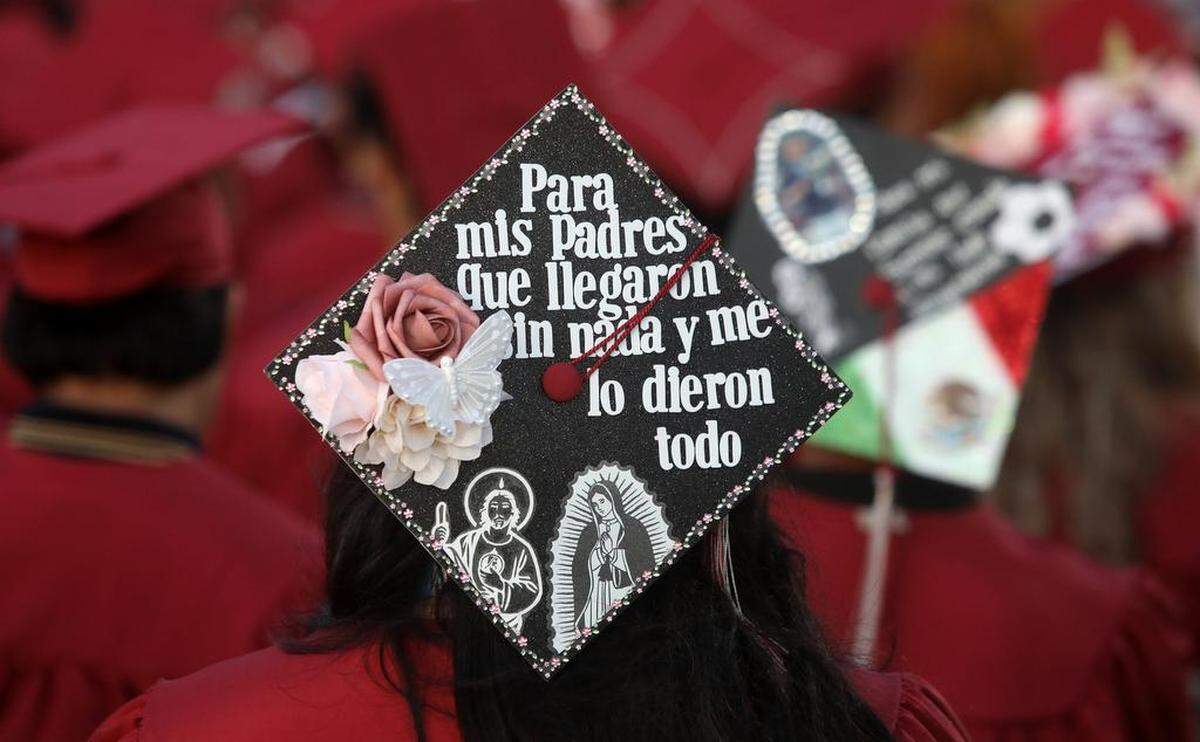A graduate expresses herself during the first graduation ceremony for Matilda Torres High School at Madera Memorial Stadium on June 10, 2023.