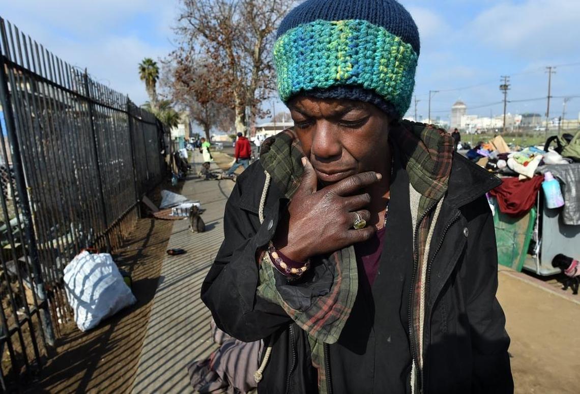 Rozetta “Mama Roze” Landrum, 52, pauses while talking about the daily no-camping ordinance sweeps.