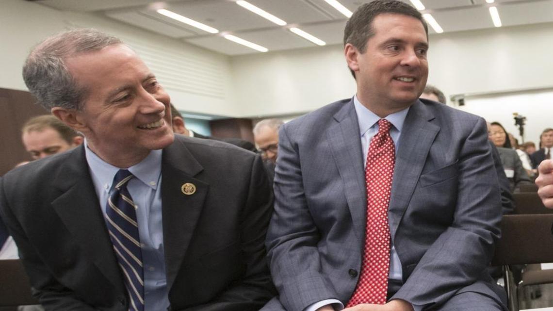 House Intelligence Committee Chairman Rep. Devin Nunes, R-Tulare, right, and House Armed Services Committee Chairman Rep. Mac Thornberry, R-Texas, left, talk in Washington during a June 2016 hearing. President-elect Donald Trump has added Nunes to the executive committee of his transition team.