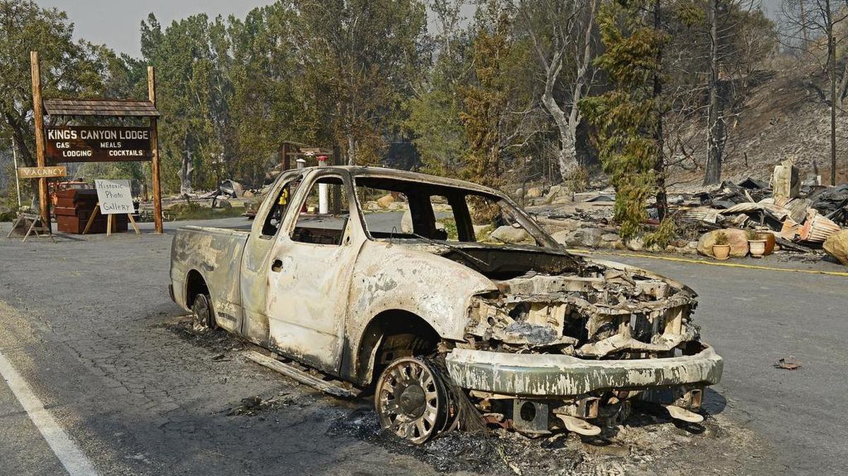 
A burned pick-up sits in front of the destroyed Kings Canyon Lodge in Kings Canyon National Park Friday. The historic lodge was burned to the ground from the Rough fire which continues to burn toward Hume Lake.
