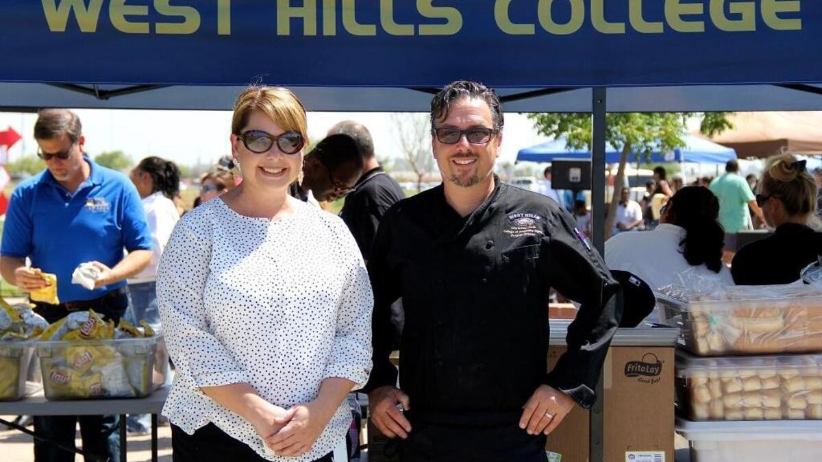 
Culinary arts faculty Christian Raia, right, and Amy Babb, attend the annual President’s BBQ  at West Hills College Lemoore.
