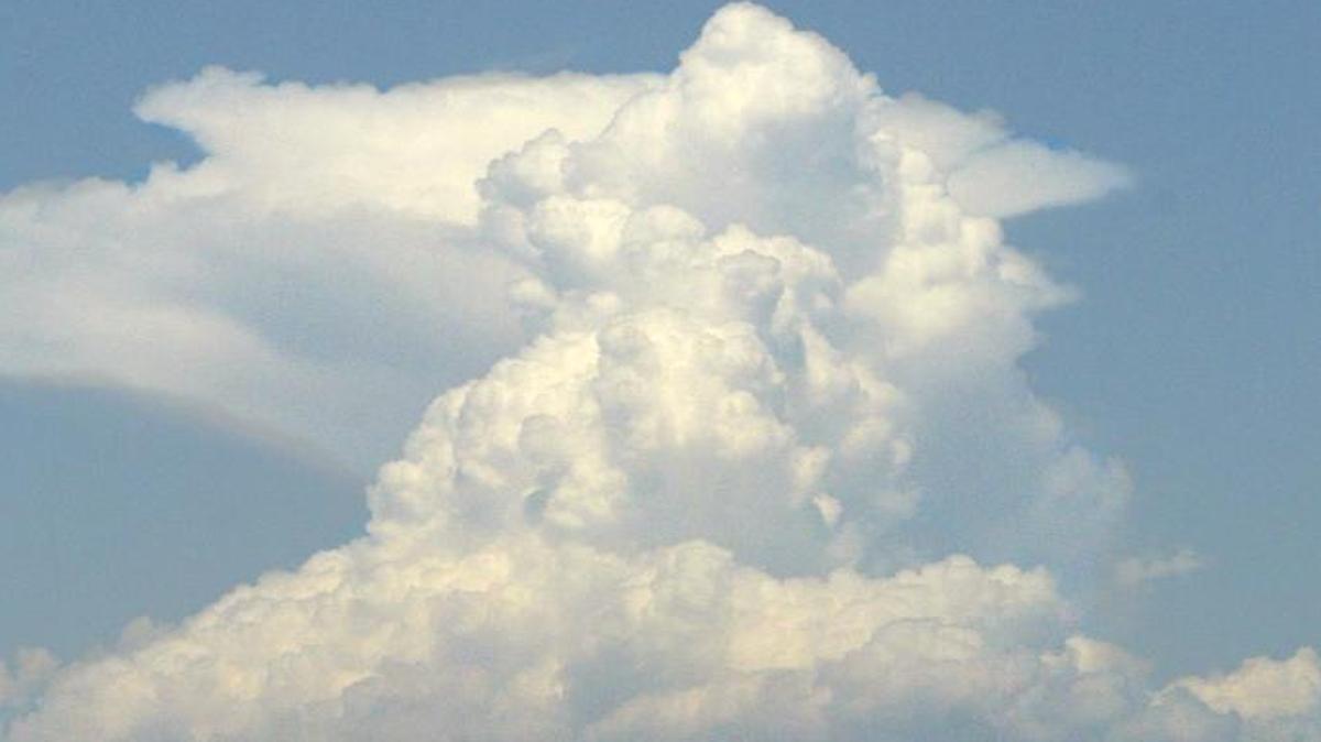 A towering cloud such as this may form over the Sierra this weekend. Thunderstorms often form over the mountain range this time of year.