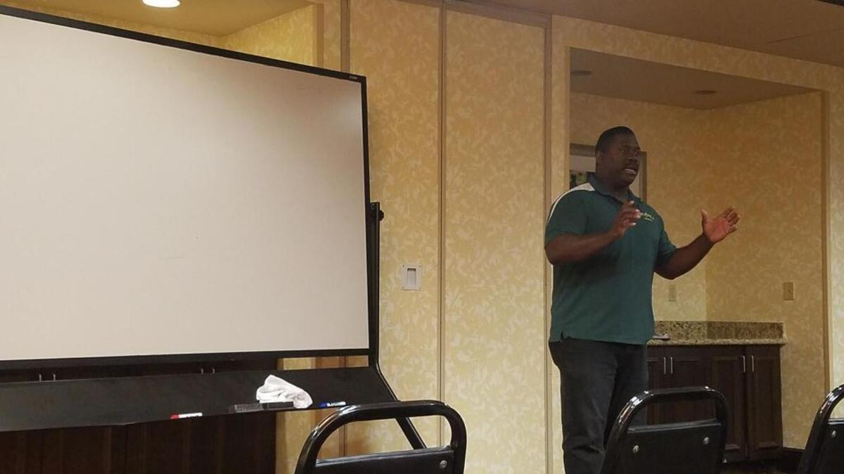 Shawn Wills, a parent, discusses the need for action regarding racism and intolerance at Clovis Unified schools during a meeting at the Hilton Garden Inn on Monday, Oct. 23, 2017.