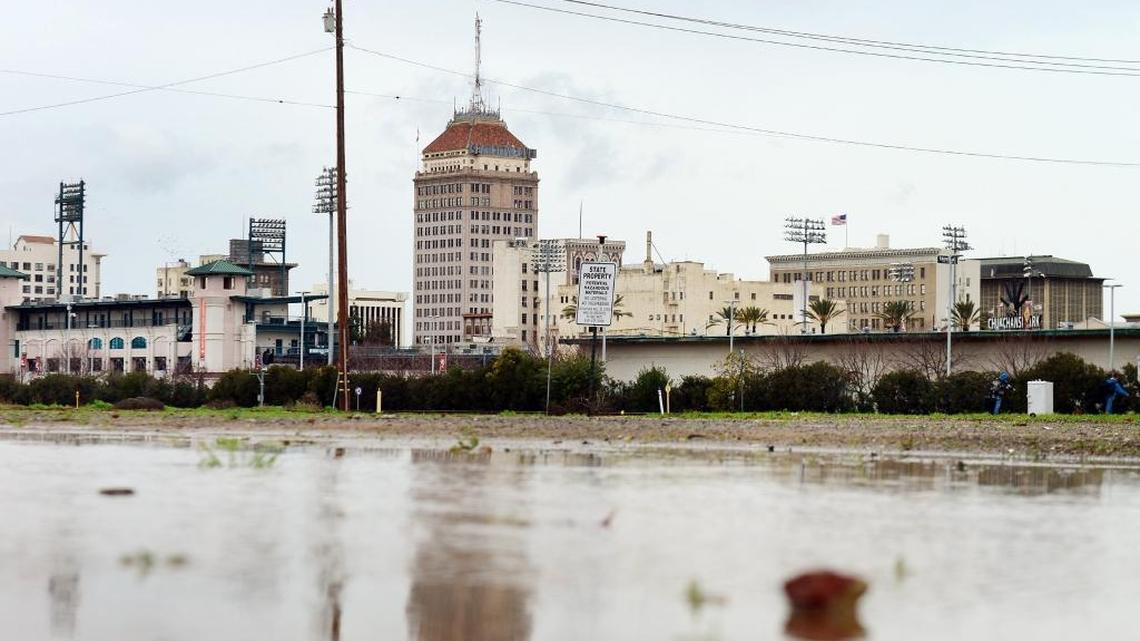 Clouds, wind and rain dampen the downtown Fresno area on Sunday.