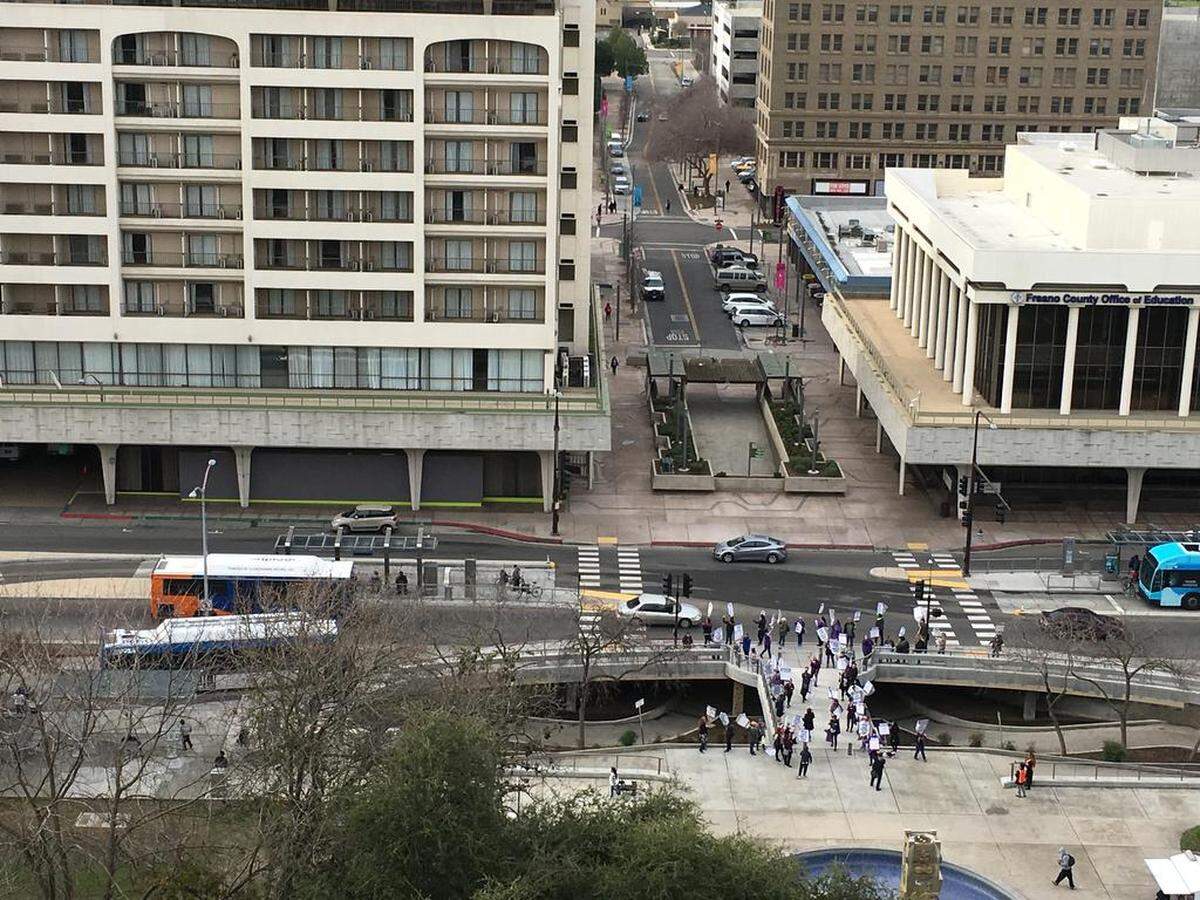 A portion of the estimated 150 workers striking outside the Fresno County Superior Court gathered at Courthouse Park on Van Ness Avenue in downtown Fresno, Calif. for the second day on Wednesday, Jan. 16, 2019.