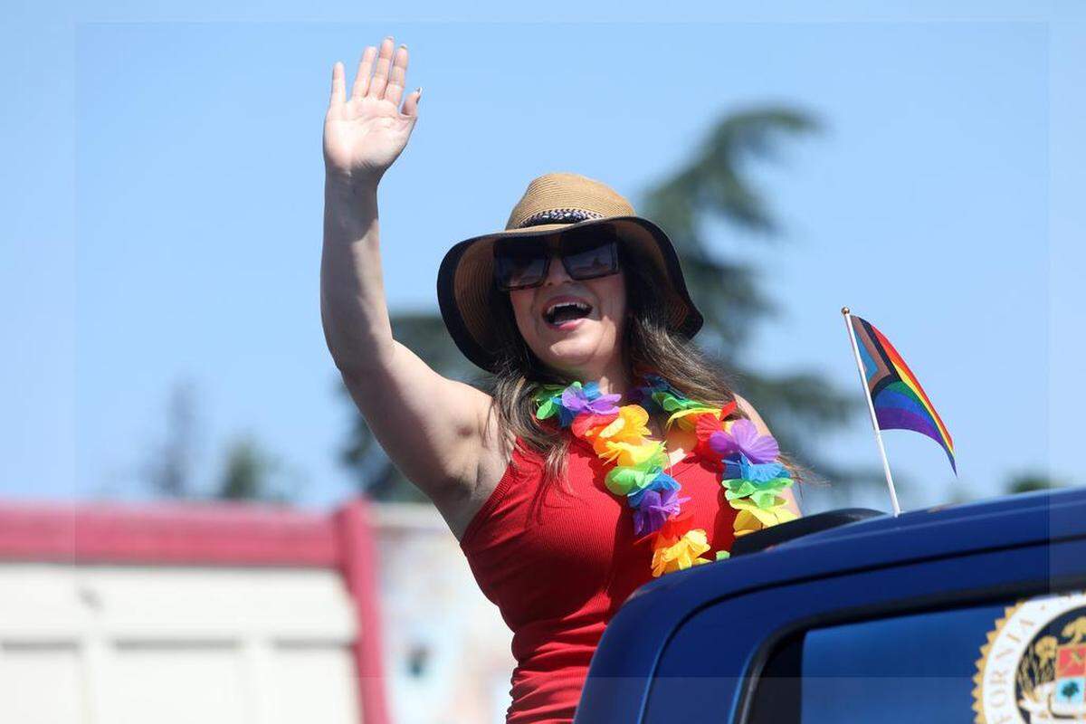 Assemblymember Esmeralda Soria waves at spectators during the Fresno Rainbow Pride Parade in the Tower District on June 3, 2023.