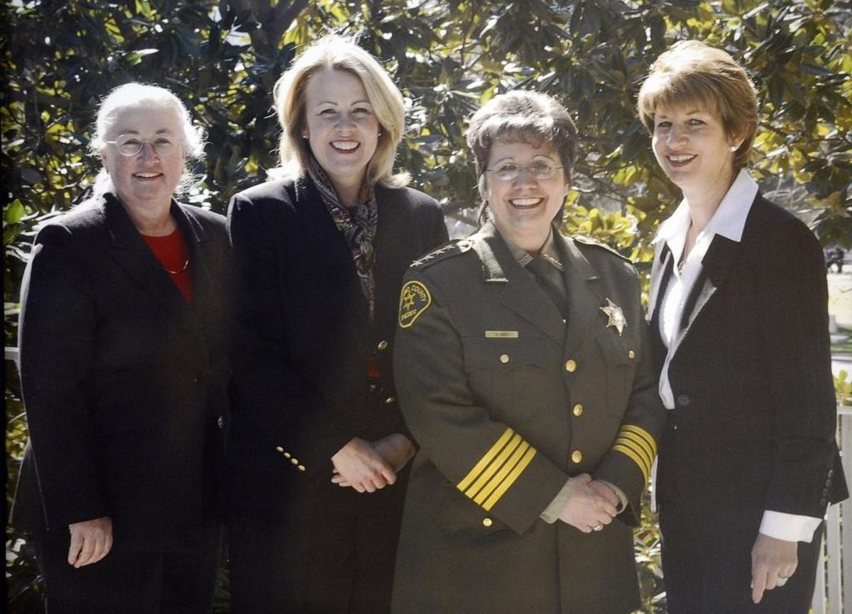 In this undated photograph, from left, Fresno County Judge Hilary Chittick, former District Attorney Elizabeth Egan, Sheriff Margaret Mims and former Chief Probation Officer Linda Penner, by photographer Howard Watkins.