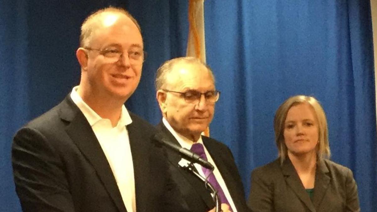 Fresno Mayor Lee Brand, center, and City Manager Wilma Quan-Schecter, right, listen as the city’s economic development director Larry Westerlund discusses Fresno’s proposal to Amazon for its planned second headquarters.