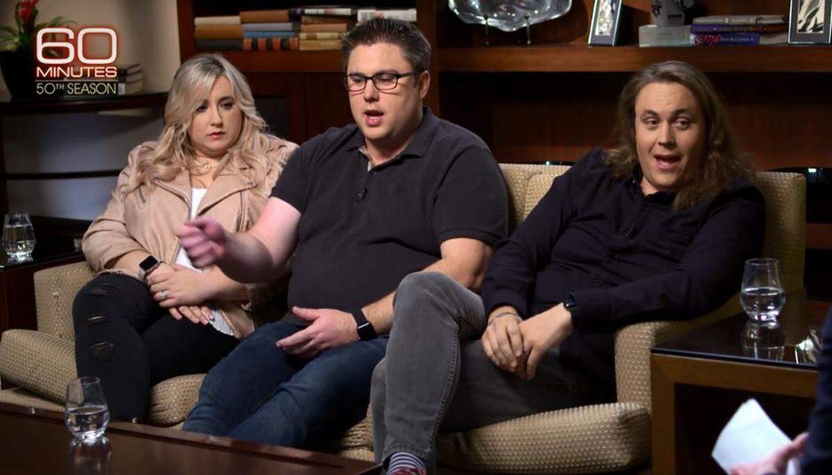 Fresno residents Scott Shuemake, center, and his brother and sister-in-law Chris Shuemake, right, and Shanyl Shoemake talk to "60 Minutes" about their experience of an Allegiant airplane filling with white smoke after landing at Fresno Yosemite International Airport in September 2017.