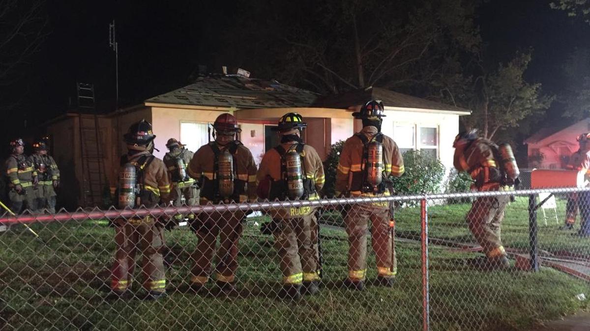 Fresno firefighters after an attic fire in a southeast Fresno home was quickly contained on Tuesday, March 29, 2016.