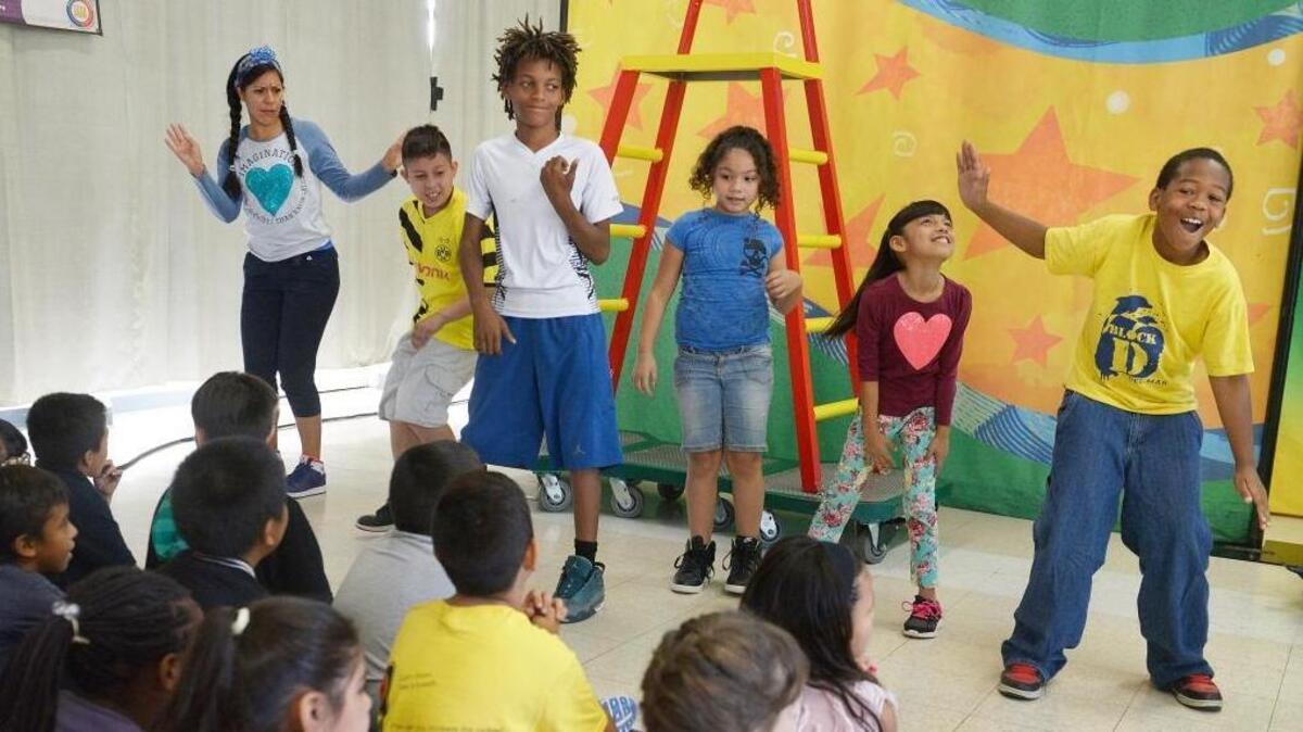 Kaiser Permanente Educational Theatre performer Emily Alvarado gets some help from Del Mar Elementary School students during a dance segment in the program’s play, “The Best Me,” to help kids focus on helathy lifestyles, held at the Fresno Unified school in September 2016. In the play, performers took roles as everyday kids, using audience interaction, comedy, music and dance to promote the importance of healthy eating, exercise and limiting television, computer and game screen time.