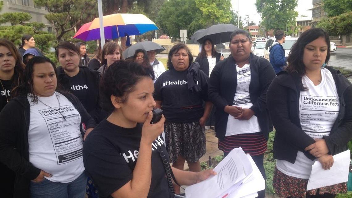Sandra Celedon-Castro, Fresno Building Healthy Communities manager, speaking at a rally in 2014 outside the Fresno County Hall of Records in support of health care for undocumented immigrants. Since then, Fresno County created a $5.6 million fund for specialty medical services.