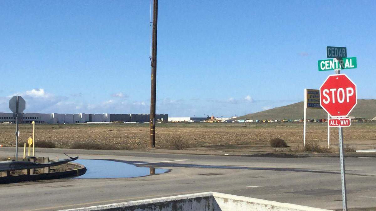 A new 110-acre industrial park is planned for this vacant land at the northwest corner of Central and Cedar avenues in southwest Fresno. At the time this photo was taken, a new order-filling warehouse for Amazon.com was under construction in the background. That warehouse is now operating.