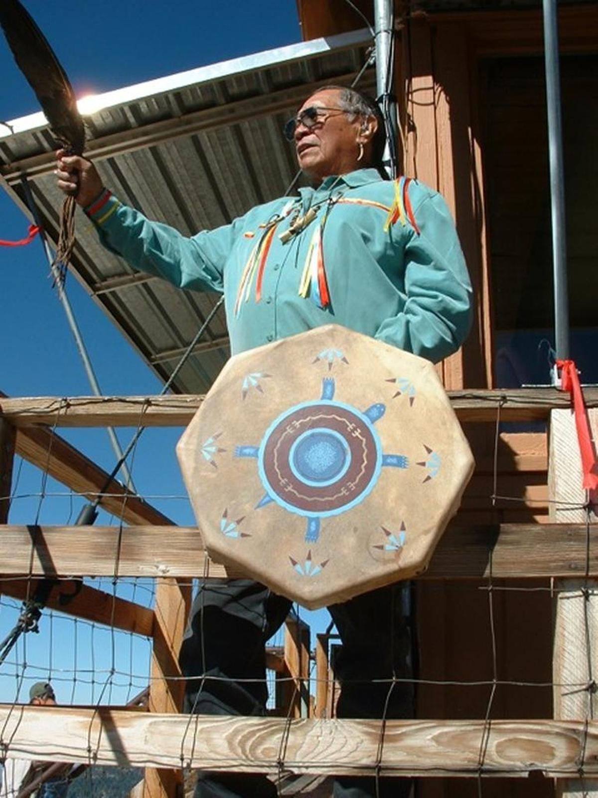 Eddie “Tupishna” Sartuche administers a Native American blessing during the annual “blessing of the rock” at the Buck Rock Lookout in Giant Sequoia National Monument.
