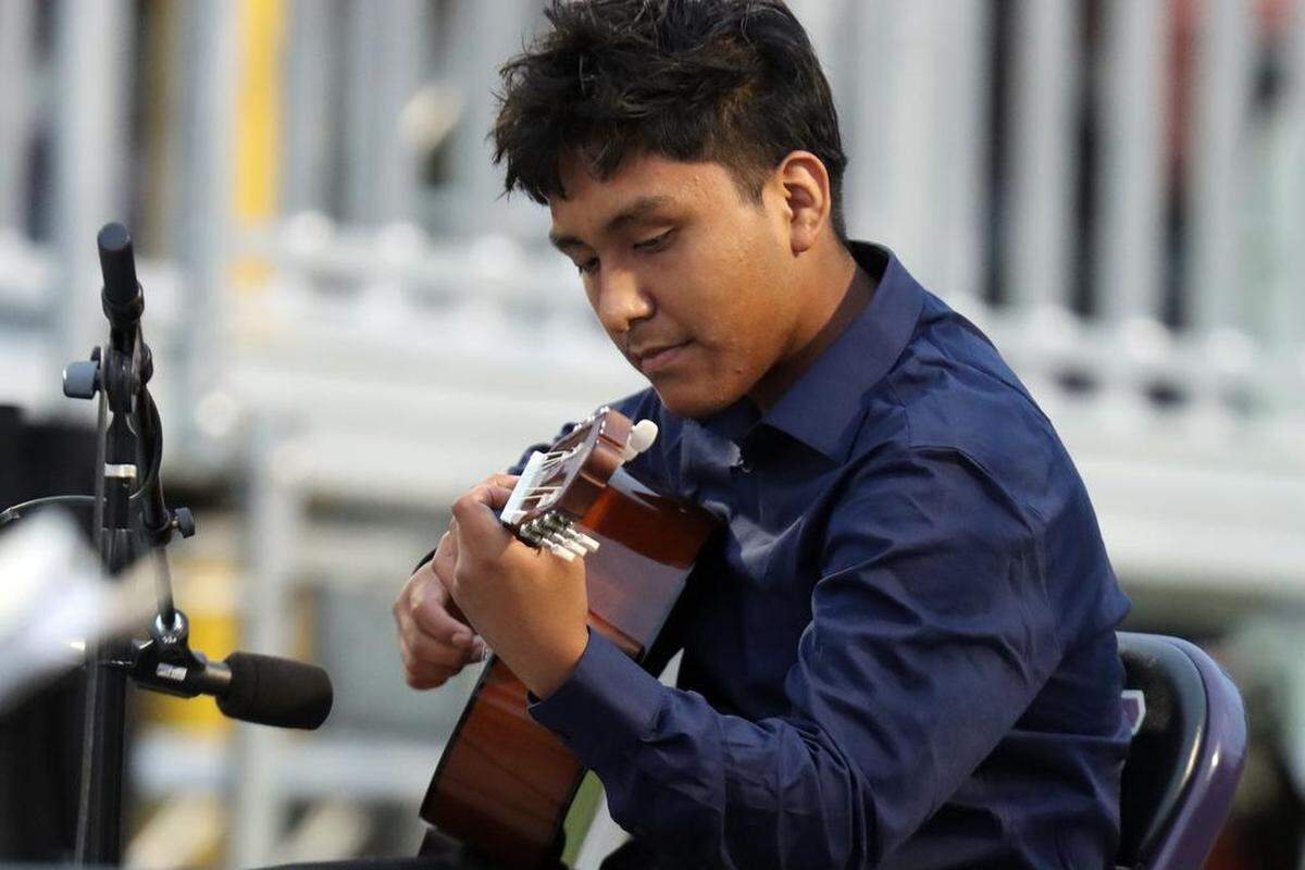 Elvin Pablo-Morales plays ‘Romanza’ during the Madera South graduation ceremony at Madera Memorial Stadium on June 7, 2023.