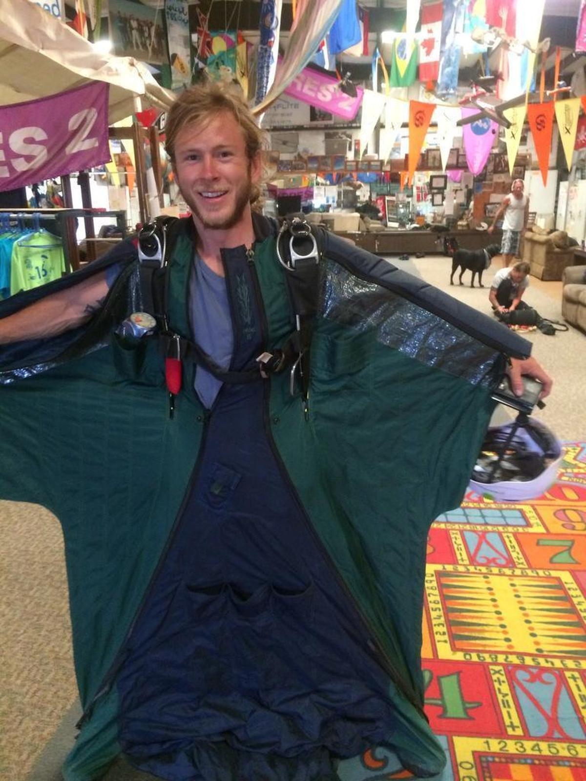 Austin Carey, 26, tries on a wingsuit at the Skydive Lodi Parachute Center in Acampo, Calif. in this undated photo from earlier this year.