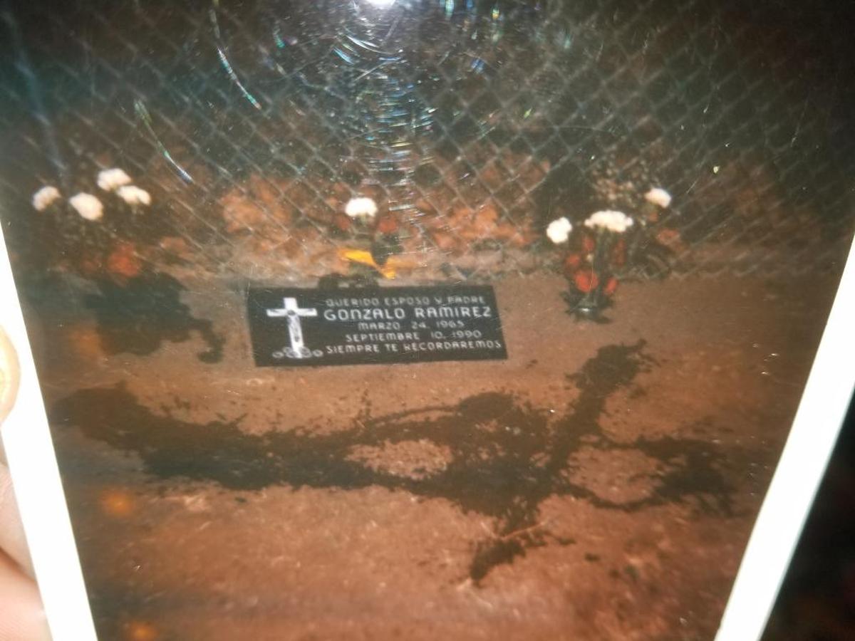 The Ramirez family had planted flowers next to the headstone in its original location, which served as a local memorial site since Gonzalo Ramirez was buried in his hometown in Mexico.