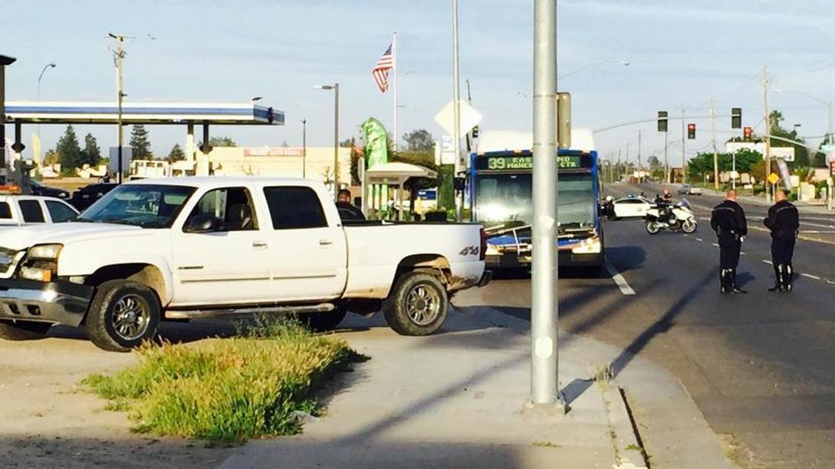 Fresno police investigate a crash on Clinton Avenue east of Marks Avenue. A pedestrian was struck and critically injured.