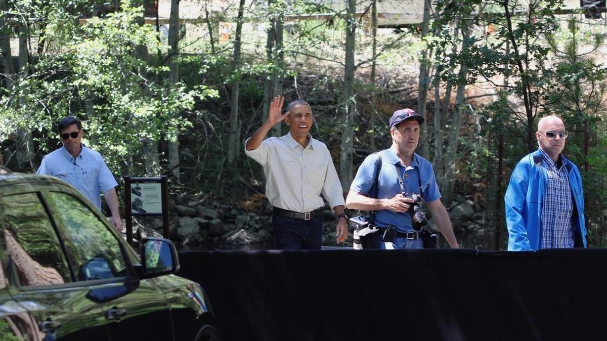 President Barack Obama waves from Cook’s Meadow in Yosemite National Park on Saturday, June 18, 2016.
