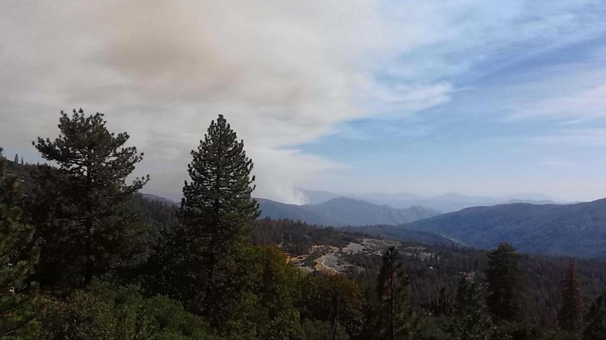 Smoke billows from the Sacata Fire.
