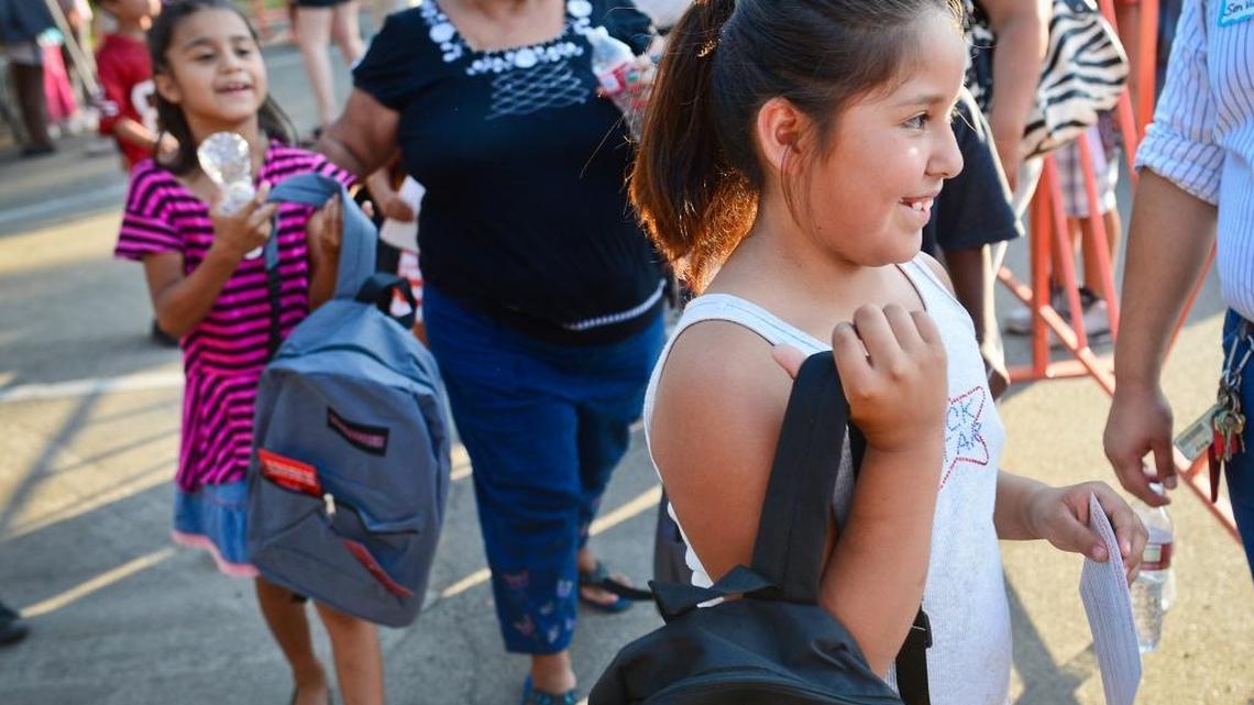 This year’s United Way of Fresno County backpack giveaway at Fresno’s Eaton Plaza, scheduled for Friday, July 29, 2016, will be postponed until Aug. 12, city officials said. At the giveaway in 2014, kids walked away with smiles after receiving new backpacks.